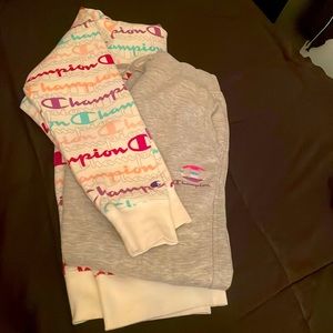 2 piece champion set comes with hoodie and matching grey sweatpants.